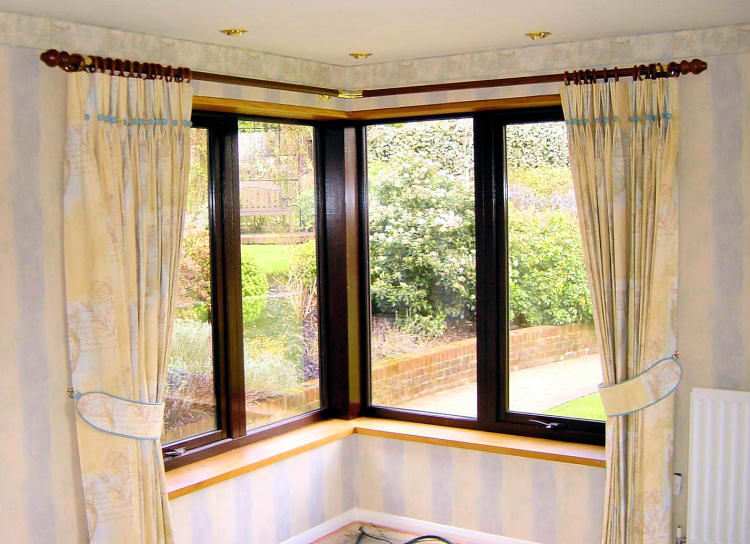 Curtains on a modern corner track